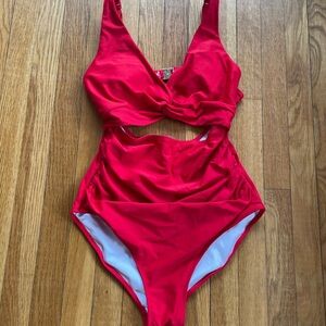 Charmo Red cutout One Piece Swimsuit size large Front Twist gold hardware